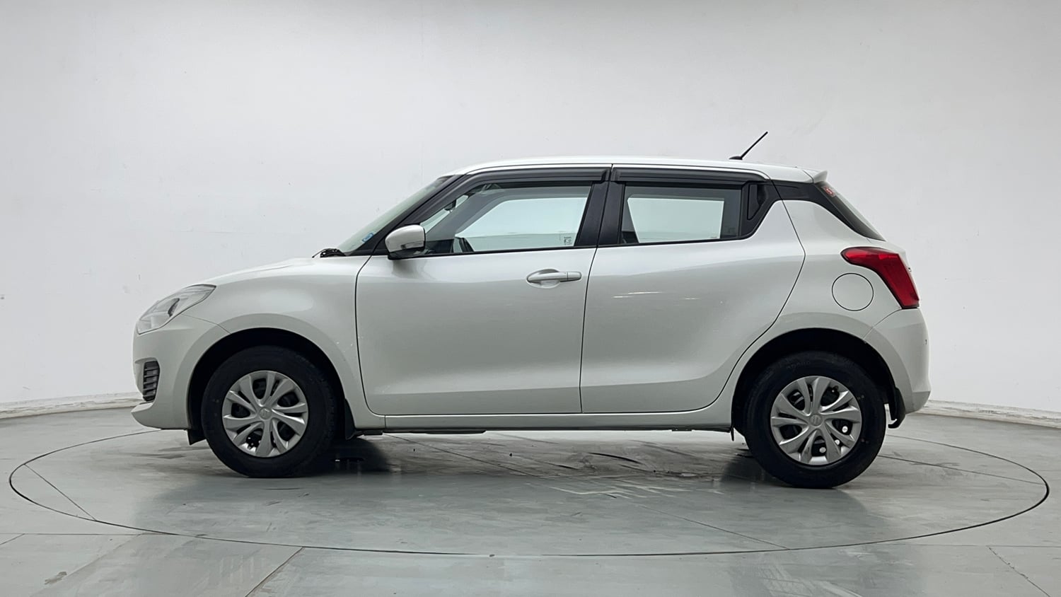 Used 2022 Maruti Suzuki Swift VXi Petrol Manual exterior LEFT SIDE VIEW