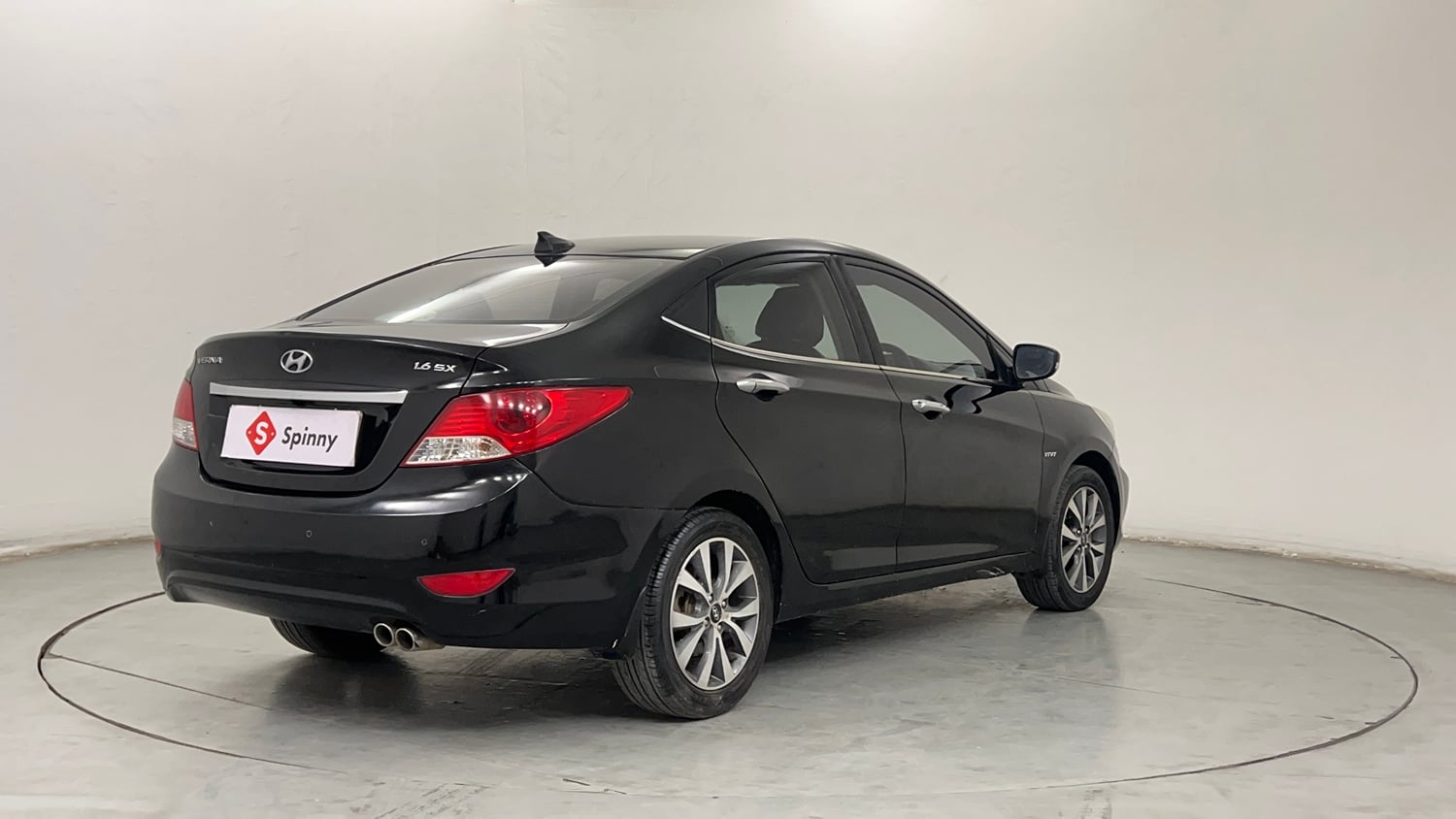 Used 2013 Hyundai Verna Fluidic 1.6 VTVT SX Petrol Manual exterior RIGHT REAR CORNER VIEW