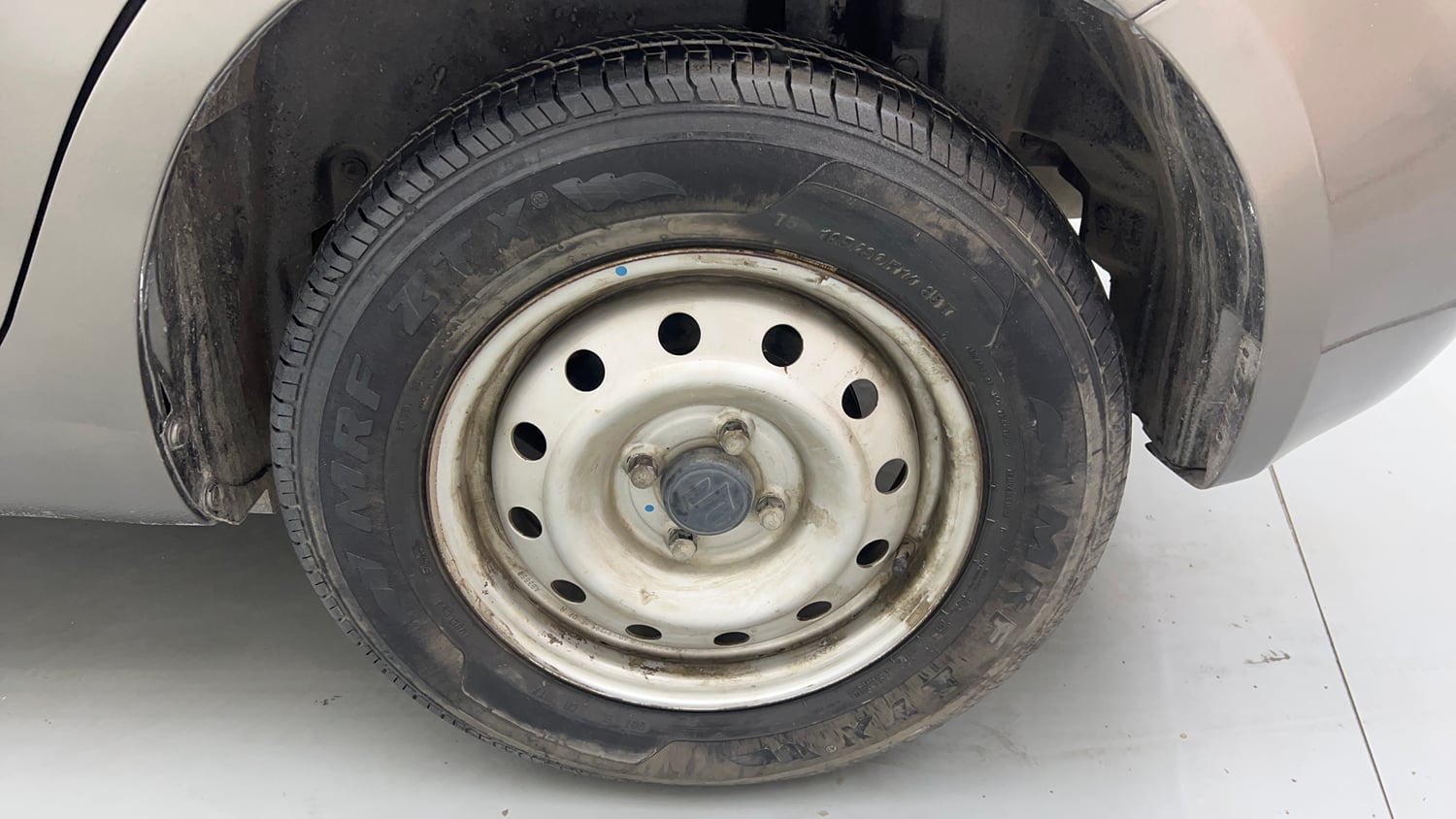 Used 2015 Maruti Suzuki Swift Dzire LXI (O) Petrol Manual tyres LEFT REAR TYRE RIM VIEW