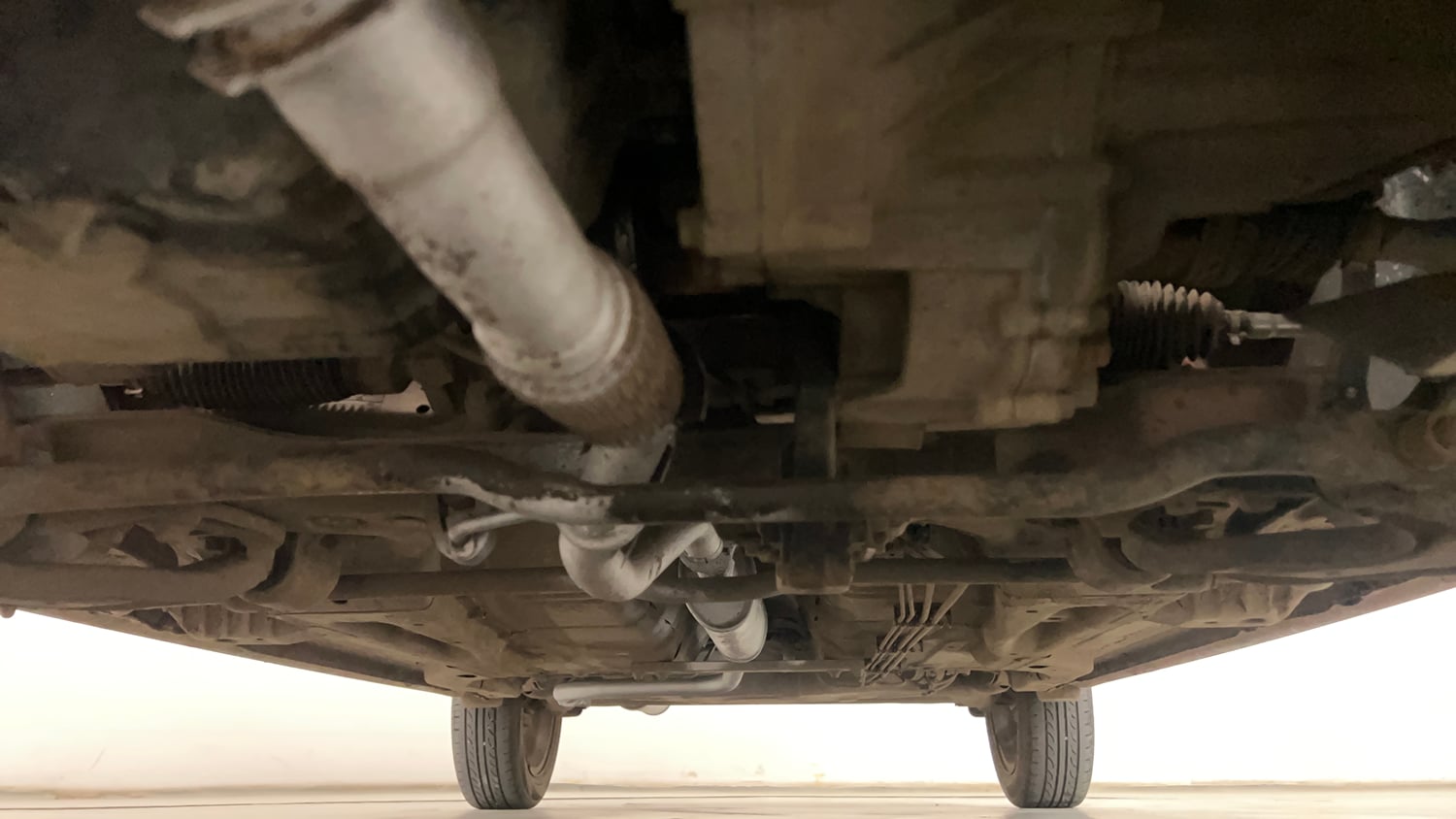 Used 2017 Tata Tigor Revotron XZ (O) Petrol Manual extra FRONT LEFT UNDERBODY VIEW