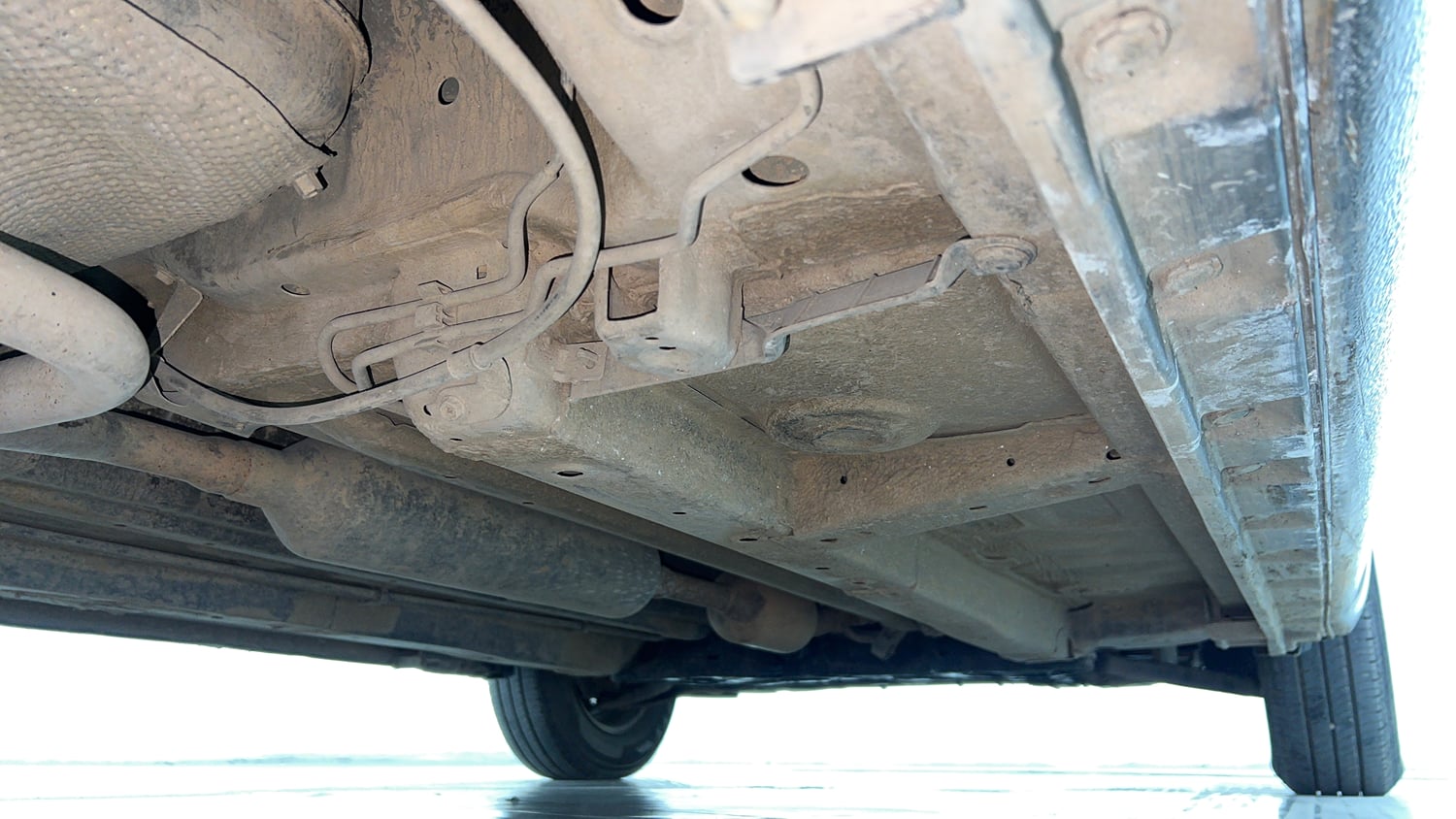 Used 2015 Maruti Suzuki Swift Dzire LXI (O) Petrol Manual extra REAR RIGHT UNDERBODY VIEW
