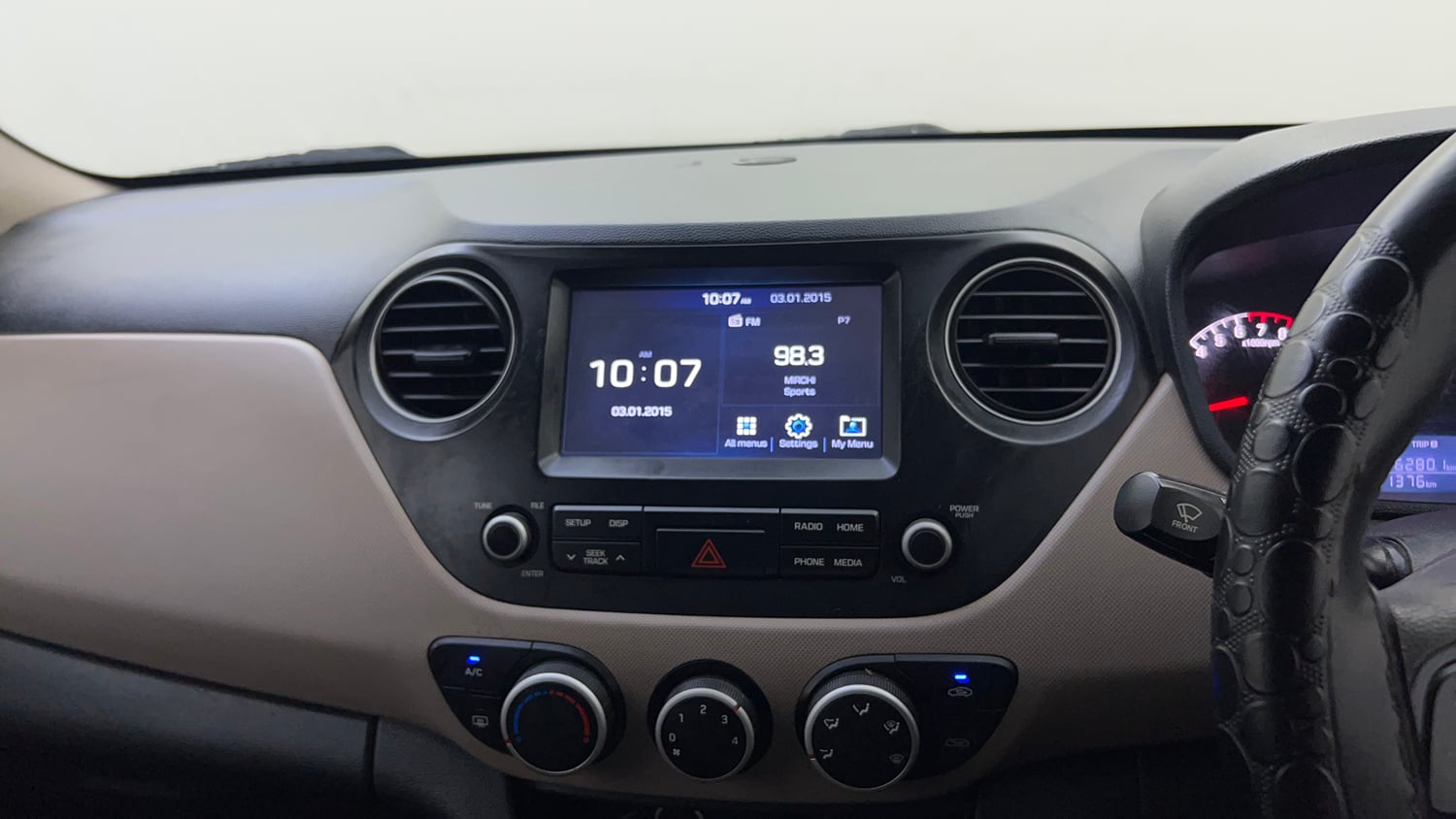 Used 2019 Hyundai Grand i10 Sportz 1.2 Kappa VTVT Petrol Manual top_features Integrated (in-dash) music system