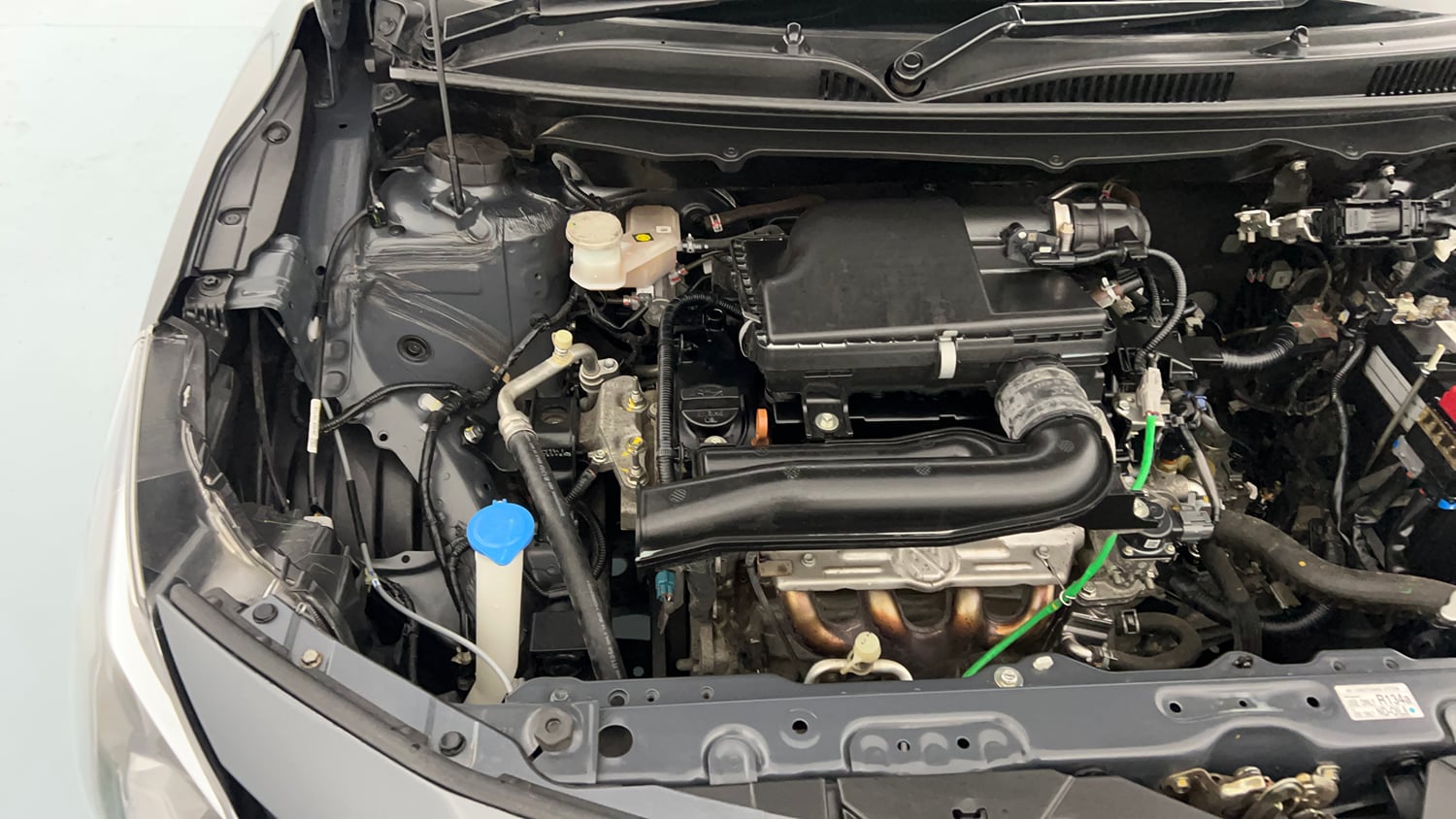 Used 2024 Maruti Suzuki Baleno Zeta MT Petrol Manual engine ENGINE RIGHT SIDE VIEW