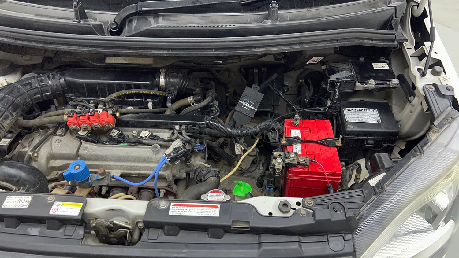 Used 2022 Maruti Suzuki Wagon R 1.0 VXi (O) 1.0 Petrol Manual engine ENGINE LEFT SIDE VIEW