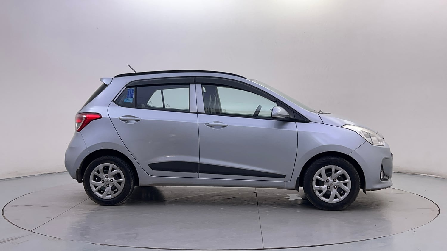 Used 2019 Hyundai Grand i10 Sportz 1.2 Kappa VTVT Petrol Manual exterior RIGHT SIDE VIEW