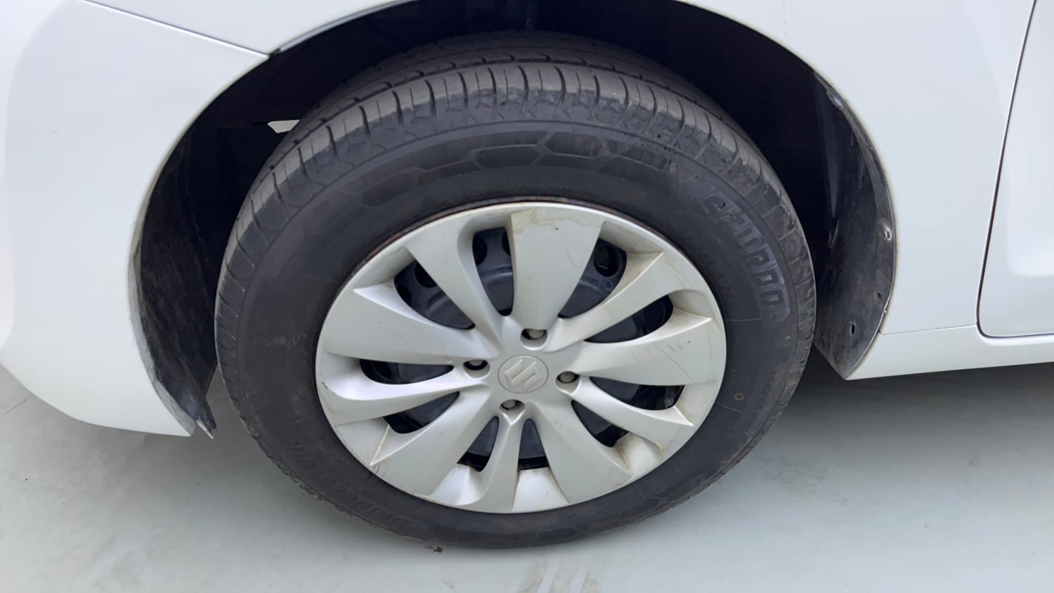 Used 2016 Maruti Suzuki Baleno Delta 1.2 Petrol Manual tyres LEFT FRONT TYRE RIM VIEW