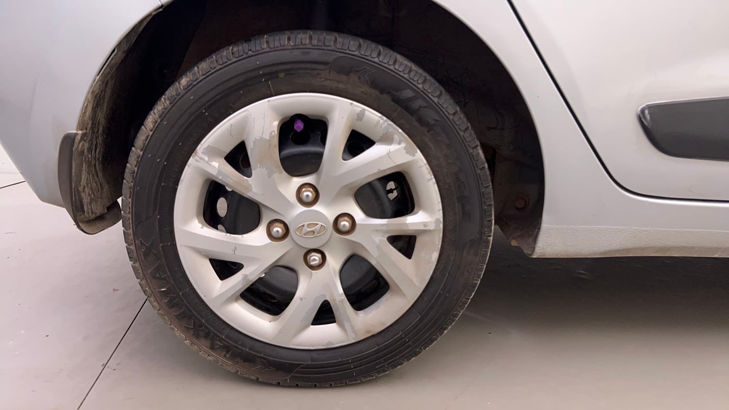 Used 2019 Hyundai Grand i10 Sportz 1.2 Kappa VTVT Petrol Manual tyres RIGHT REAR TYRE RIM VIEW