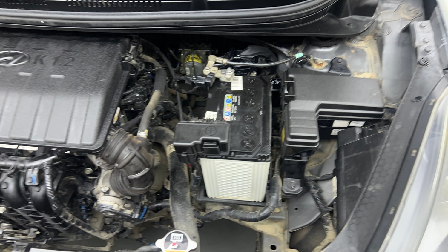 Used 2022 Hyundai Grand i10 Nios Sportz 1.2 Kappa VTVT Petrol Manual engine ENGINE LEFT SIDE VIEW