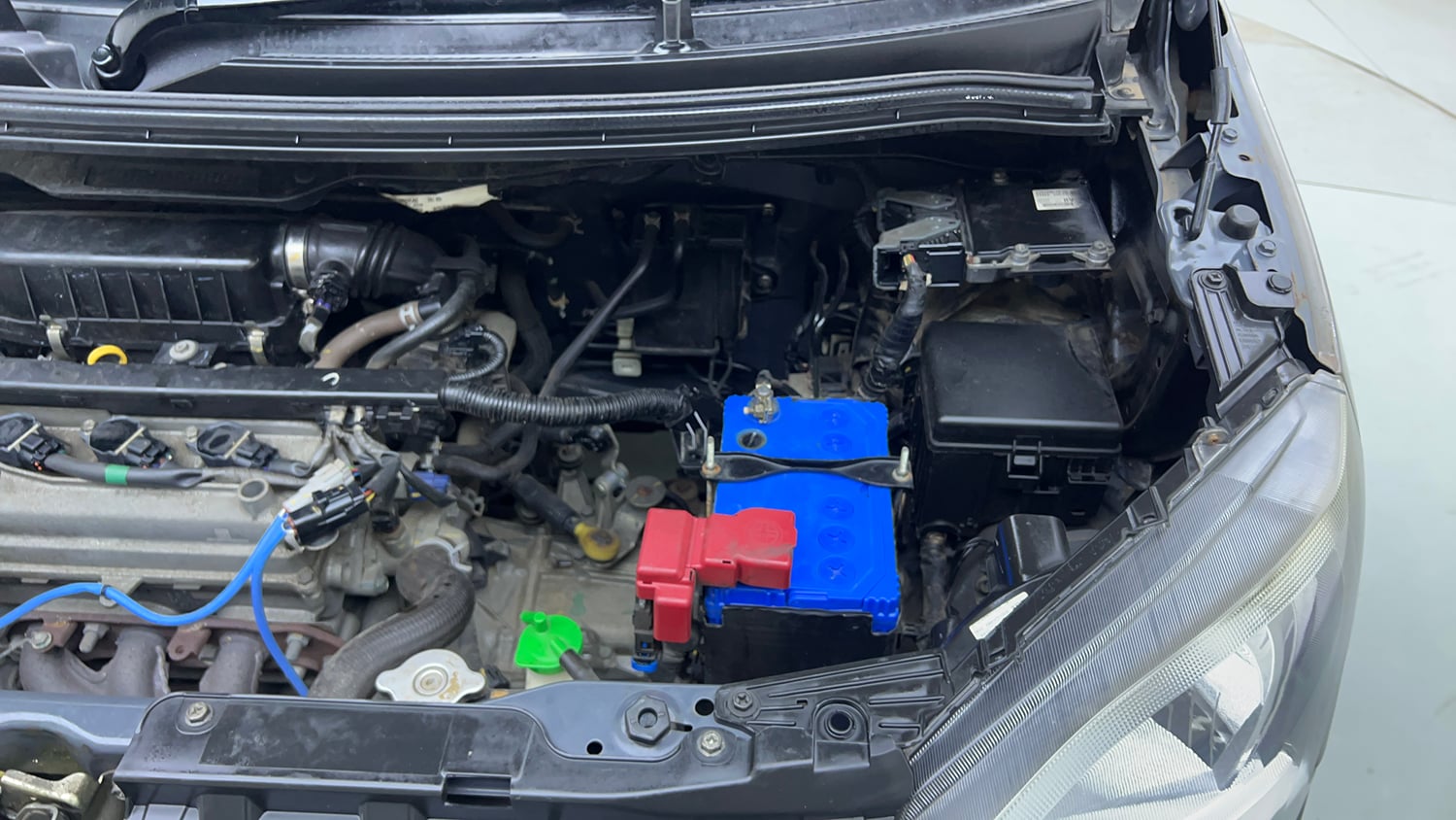 Used 2021 Maruti Suzuki Wagon R 1.0 VXi (O) 1.0 Petrol Manual engine ENGINE LEFT SIDE VIEW