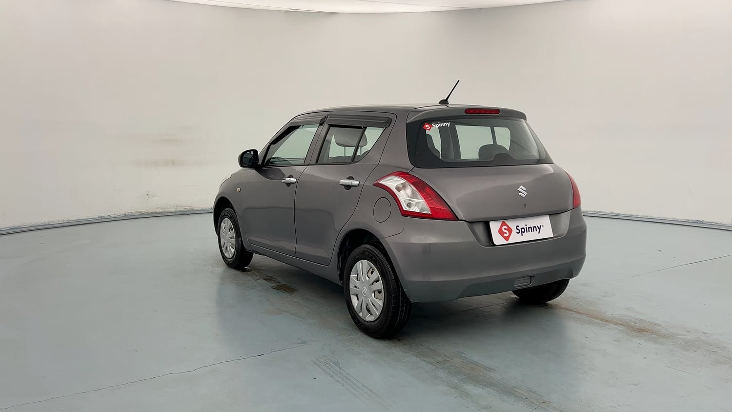 Used 2017 Maruti Suzuki Swift LXi Petrol Manual exterior LEFT REAR CORNER VIEW