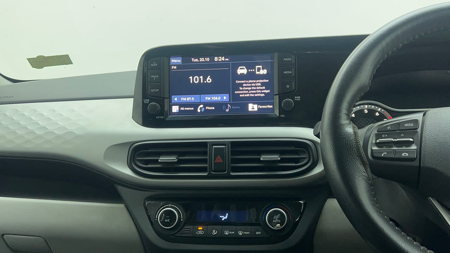 Used 2022 Hyundai Grand i10 Nios Sportz 1.2 Kappa VTVT Petrol Manual top_features Integrated (in-dash) music system