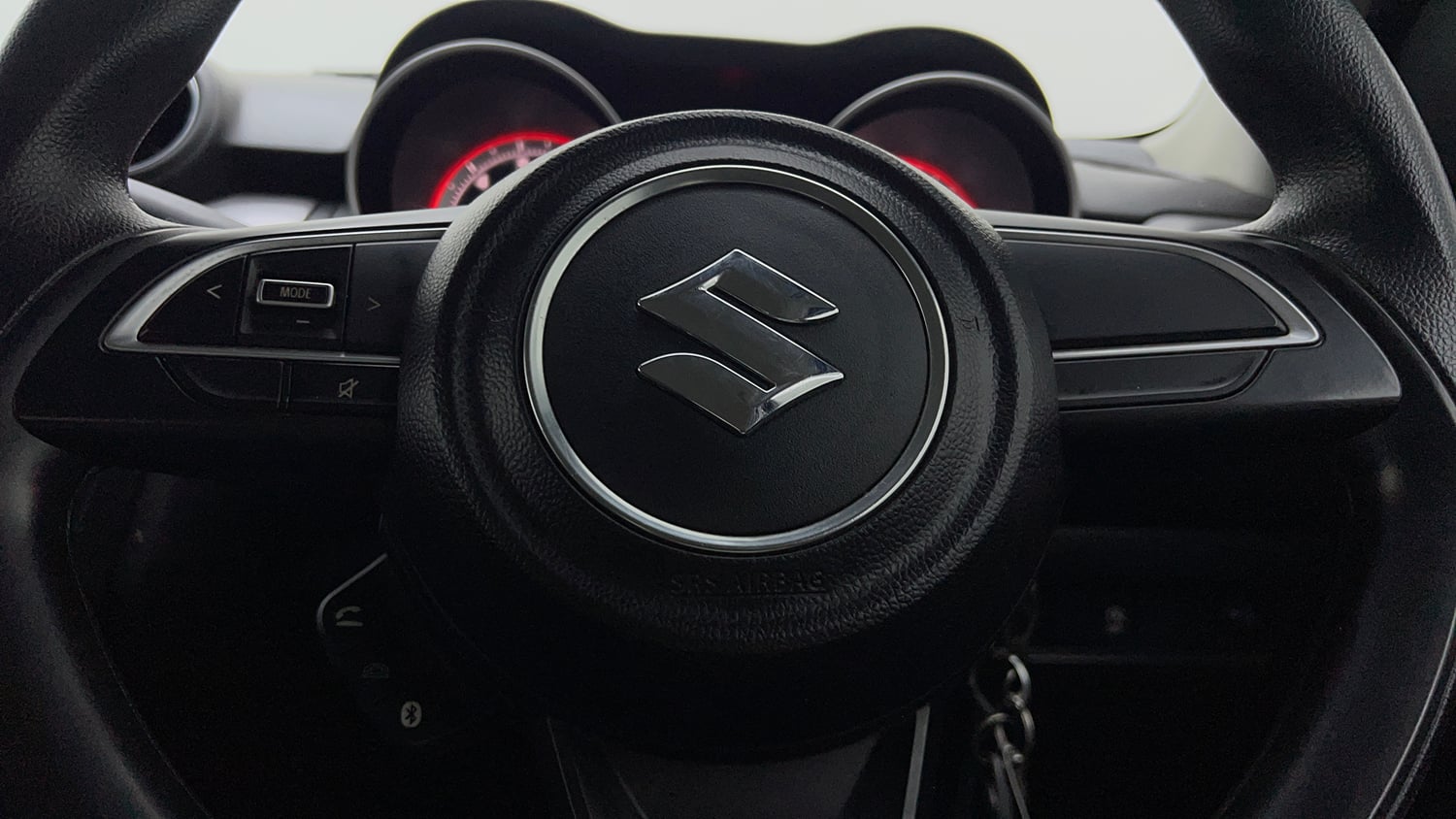 Used 2022 Maruti Suzuki Swift VXi Petrol Manual top_features Steering mounted controls