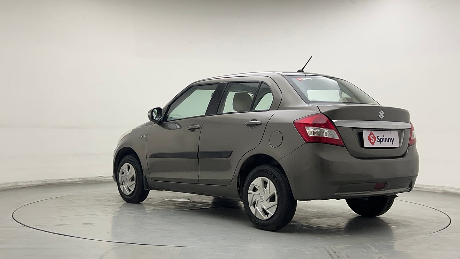 Used 2015 Maruti Suzuki Swift Dzire VXI Petrol Manual exterior LEFT REAR CORNER VIEW