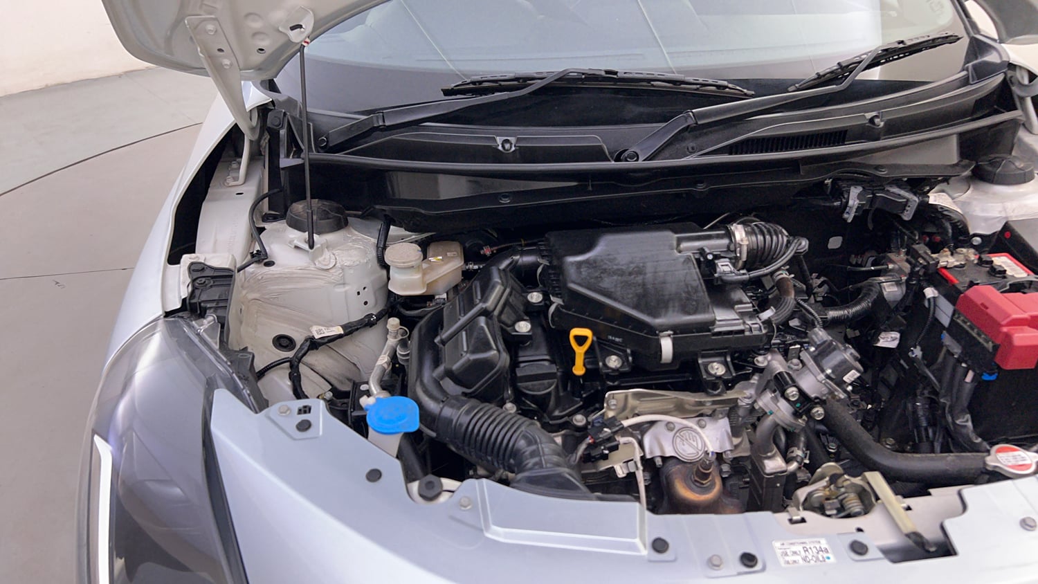 Used 2026 Maruti Suzuki Swift VXi (O) Petrol Manual engine ENGINE RIGHT SIDE HINGE & APRON VIEW