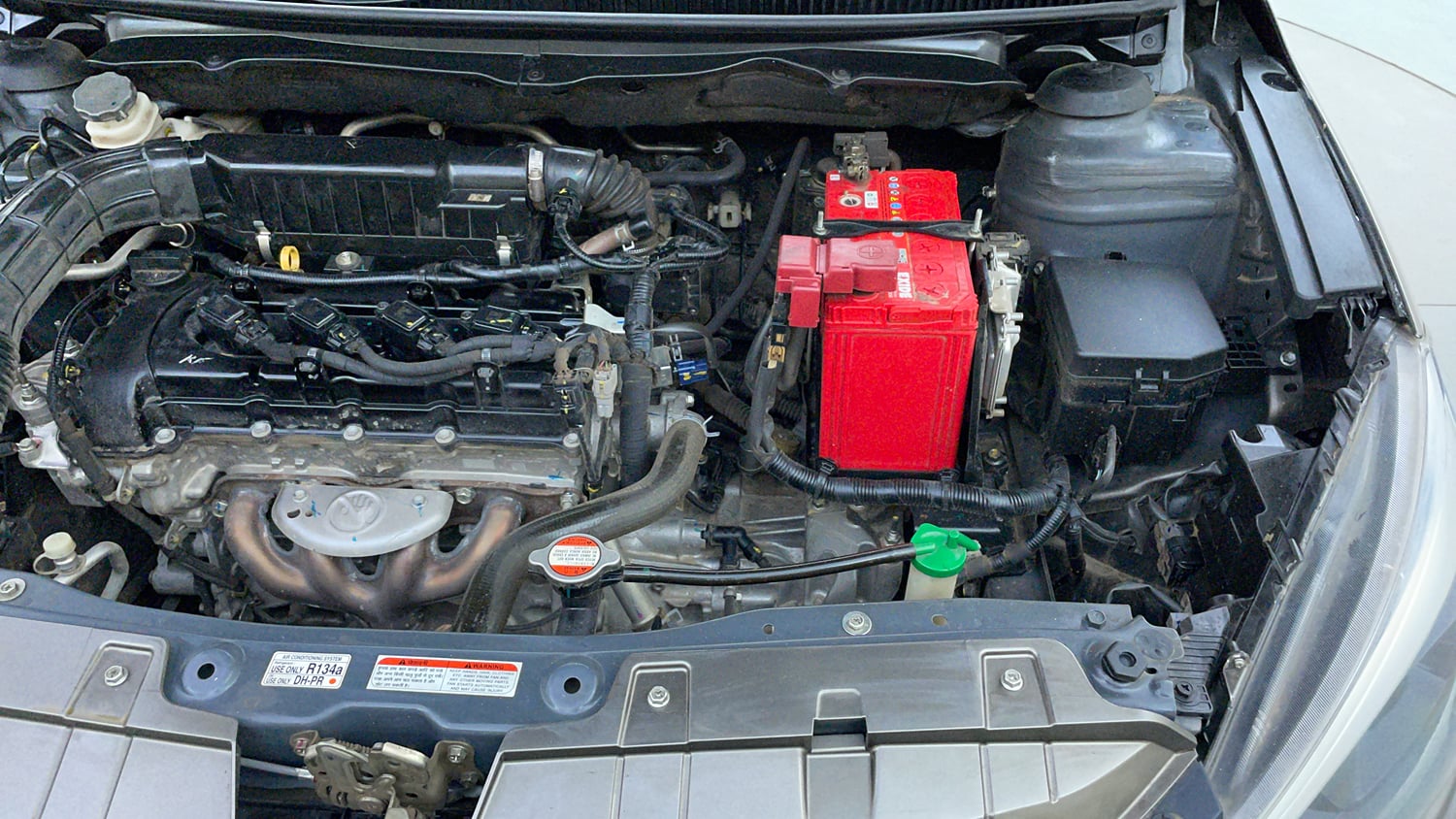 Used 2022 Maruti Suzuki Ciaz Zeta 1.5 Petrol Manual engine ENGINE LEFT SIDE VIEW
