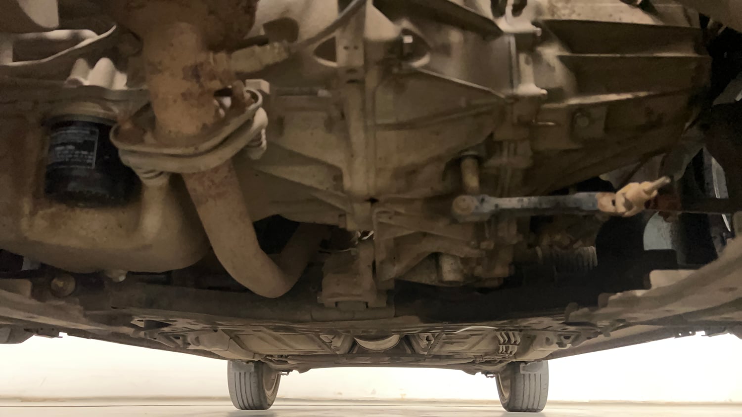 Used 2021 Maruti Suzuki Baleno Zeta Petrol Manual extra FRONT LEFT UNDERBODY VIEW