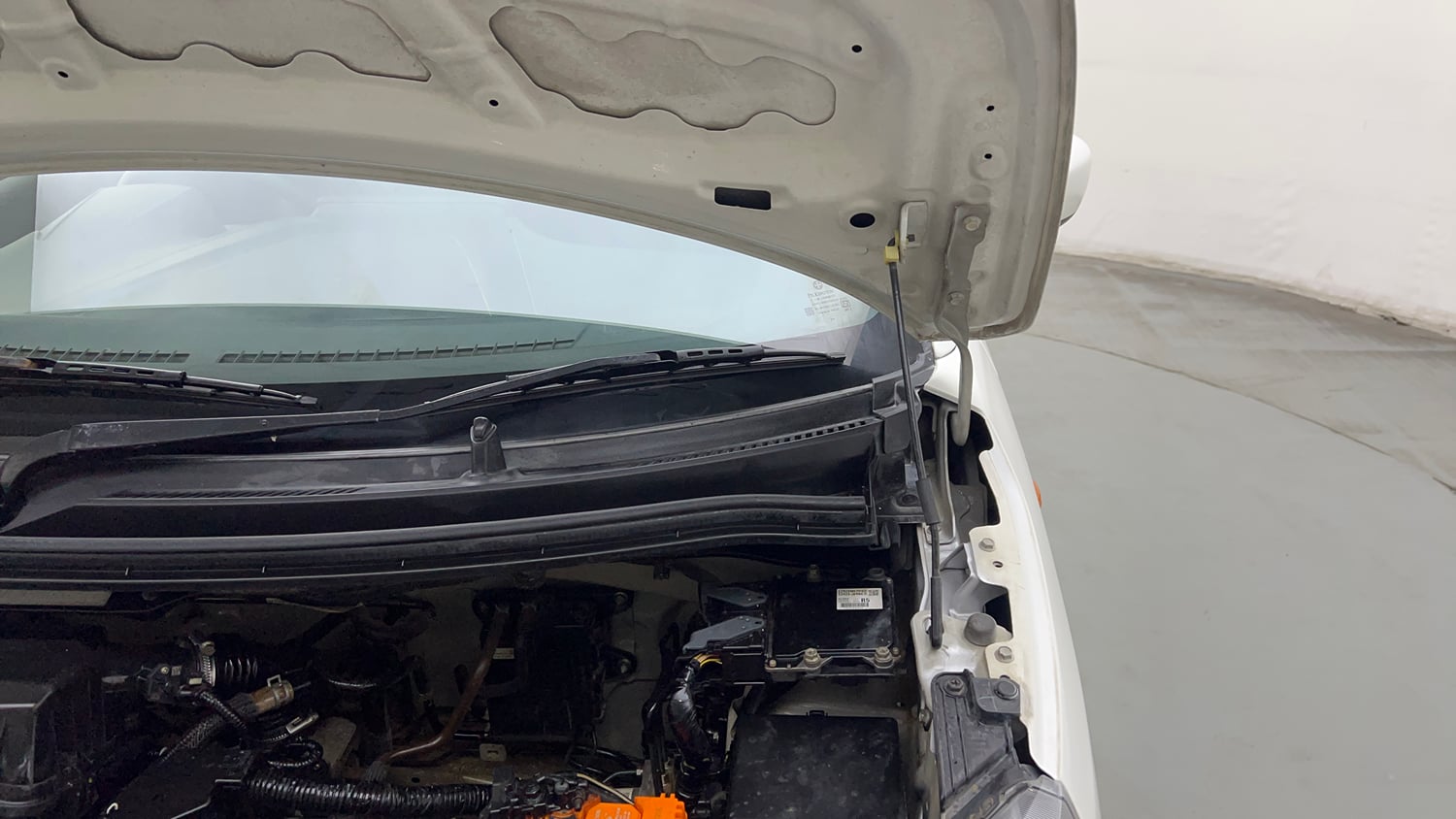 Used 2022 Maruti Suzuki Wagon R VXI 1.0 Petrol Manual engine ENGINE LEFT SIDE HINGE & APRON VIEW
