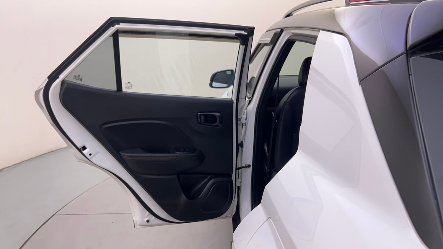 Used 2023 Hyundai Venue N-Line N6 DCT Dual Tone Petrol Automatic interior LEFT REAR DOOR OPEN VIEW