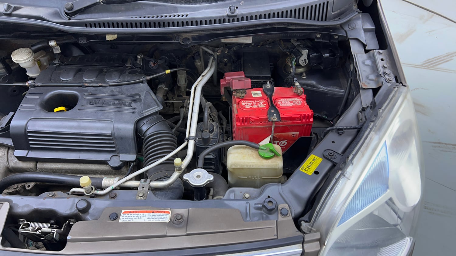 Used 2014 Maruti Suzuki Wagon R VXI Petrol Manual engine ENGINE LEFT SIDE VIEW