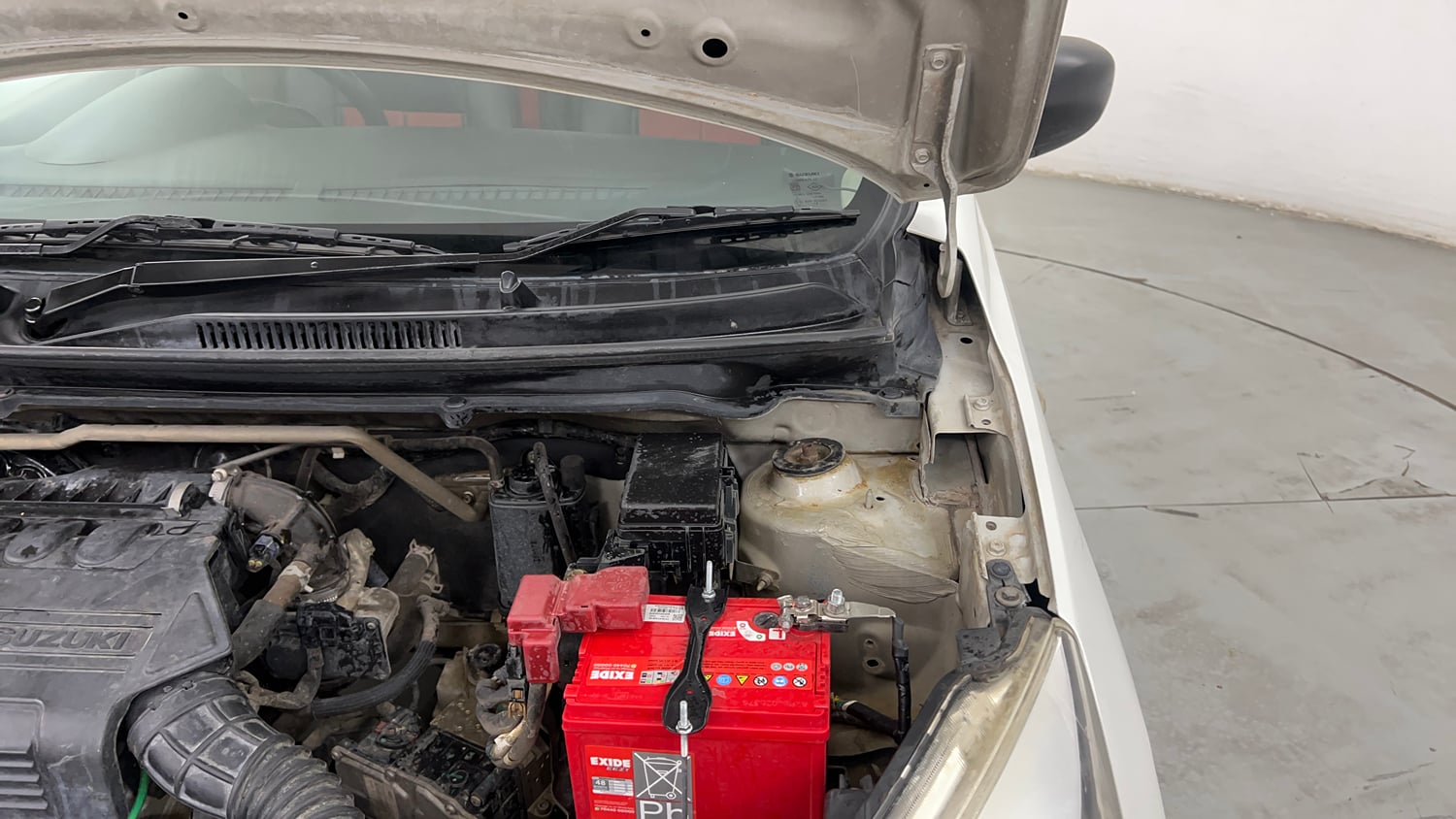 Used 2017 Maruti Suzuki Celerio VXI (O) AMT Petrol Automatic engine ENGINE LEFT SIDE HINGE & APRON VIEW