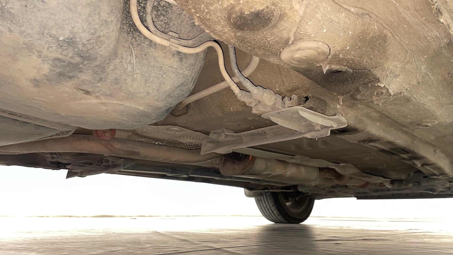 Used 2024 Skoda Slavia Style 1.0L TSI MT Petrol Manual extra REAR RIGHT UNDERBODY VIEW