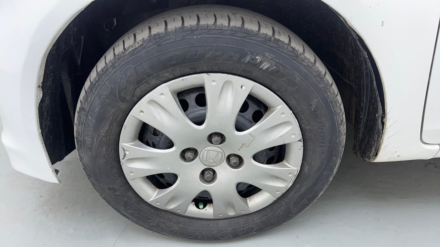 Used 2014 Honda Brio S MT Petrol Manual tyres LEFT FRONT TYRE RIM VIEW