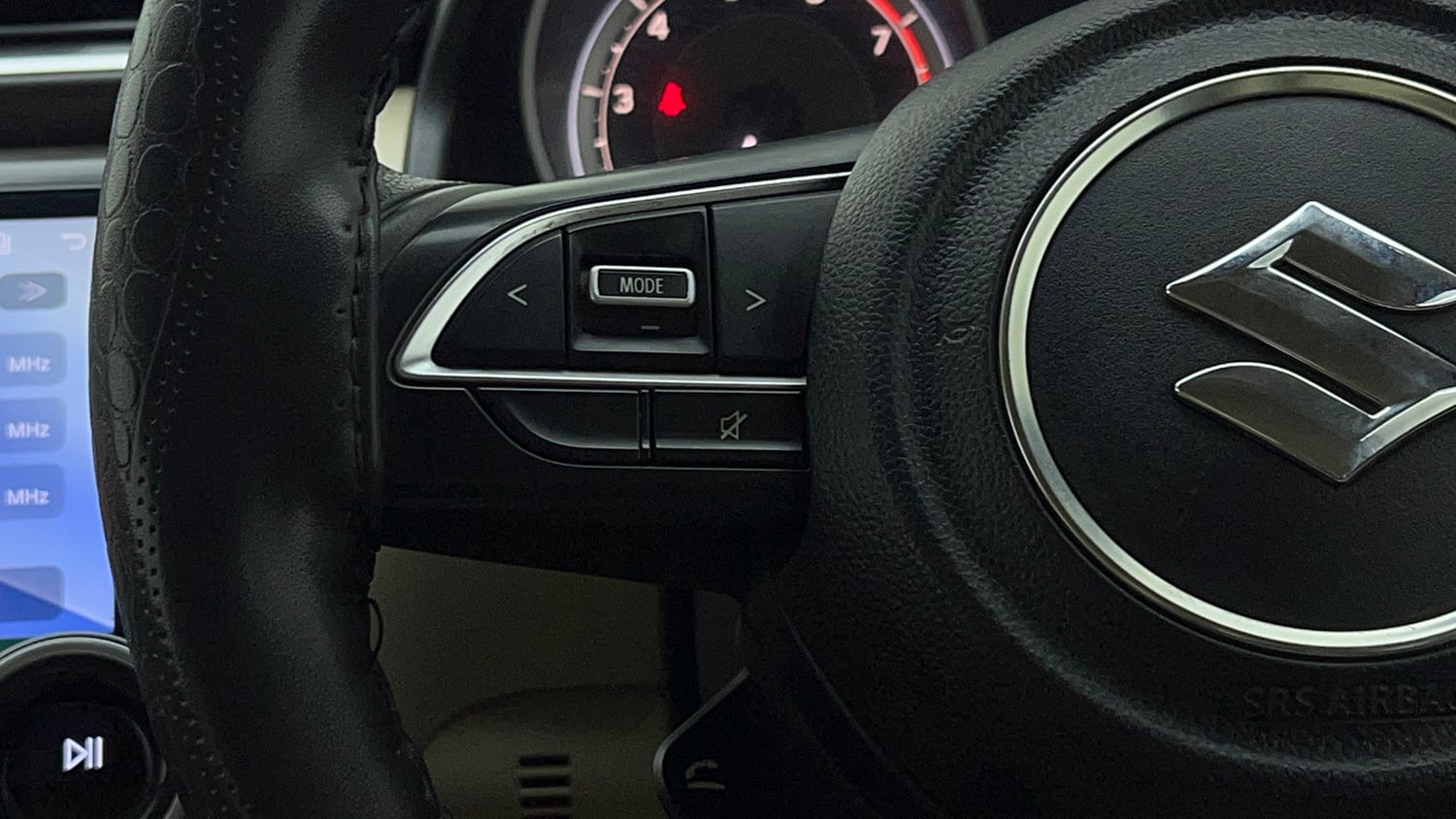 Used 2021 Maruti Suzuki Dzire VXi Petrol Manual top_features Steering mounted controls