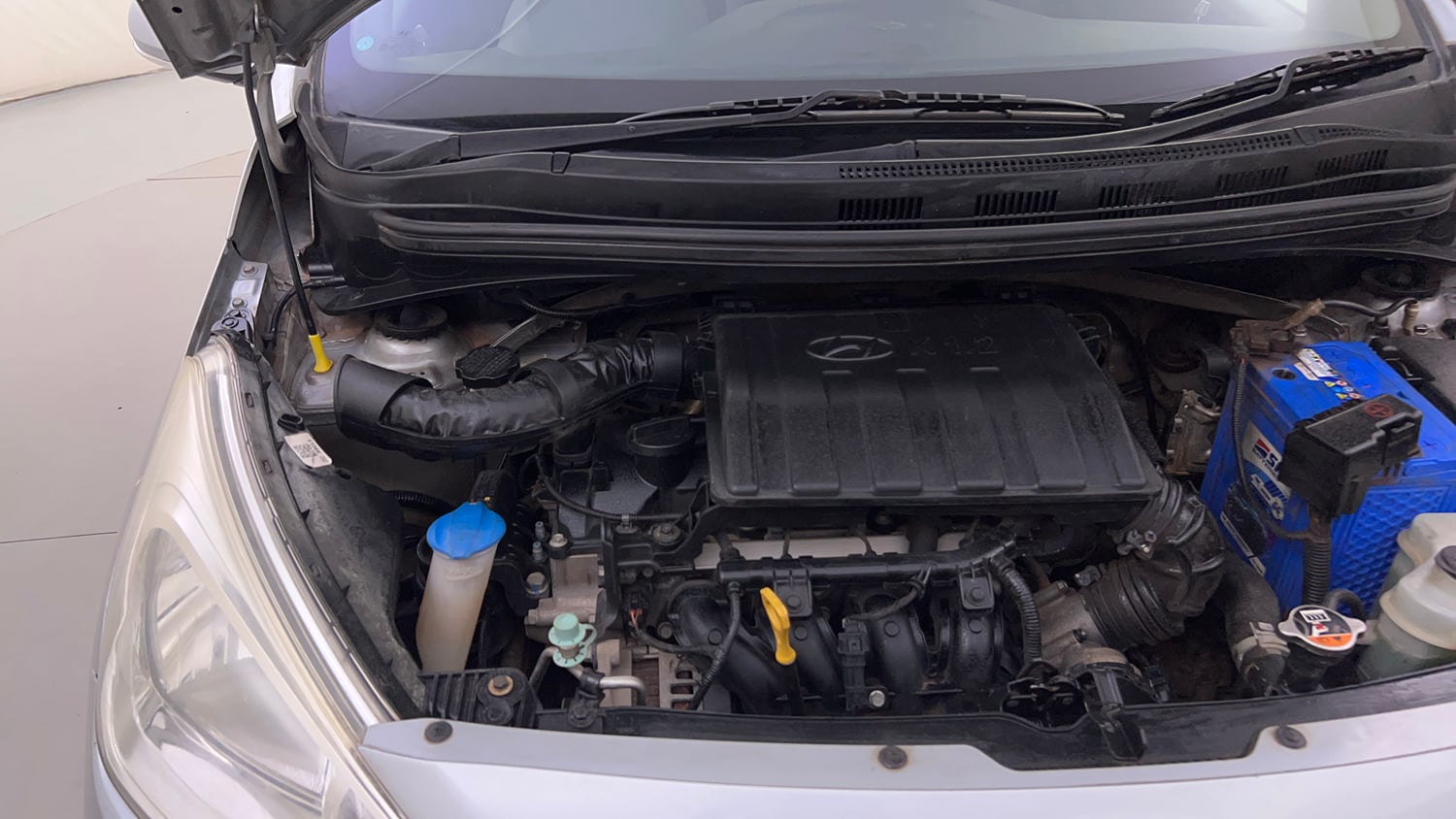 Used 2019 Hyundai Grand i10 Sportz 1.2 Kappa VTVT Petrol Manual engine ENGINE RIGHT SIDE HINGE & APRON VIEW