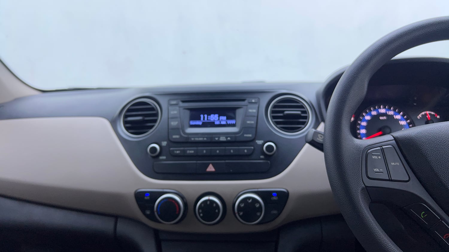 Used 2015 Hyundai Xcent S 1.2 Petrol Manual interior MUSIC SYSTEM & AC CONTROL VIEW