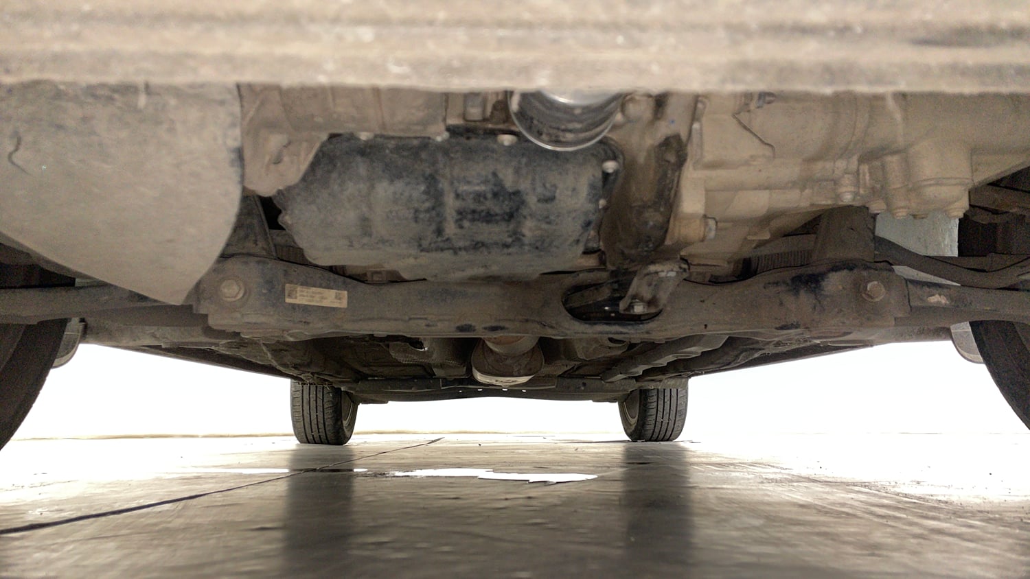 Used 2024 Skoda Slavia Style 1.0L TSI MT Petrol Manual extra FRONT LEFT UNDERBODY VIEW