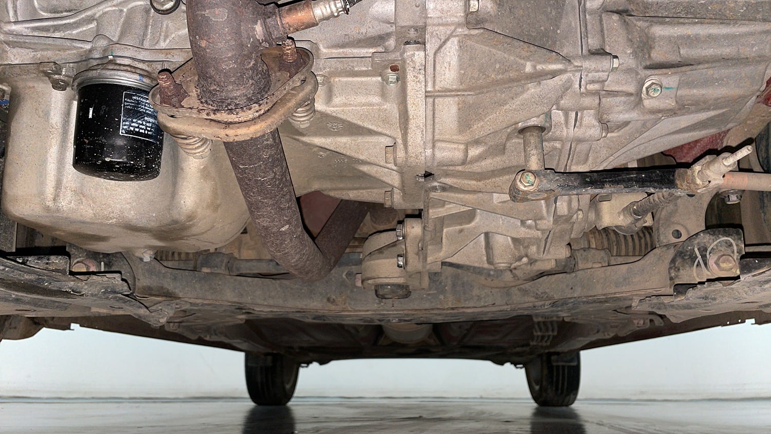 Used 2020 Maruti Suzuki Baleno Zeta Petrol Manual extra FRONT LEFT UNDERBODY VIEW