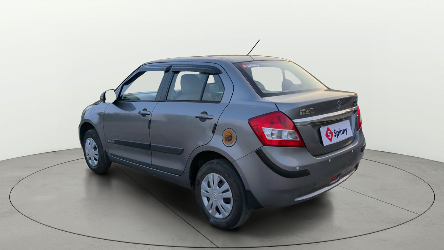 Used 2014 Maruti Suzuki Swift Dzire VXI Petrol Manual exterior LEFT REAR CORNER VIEW