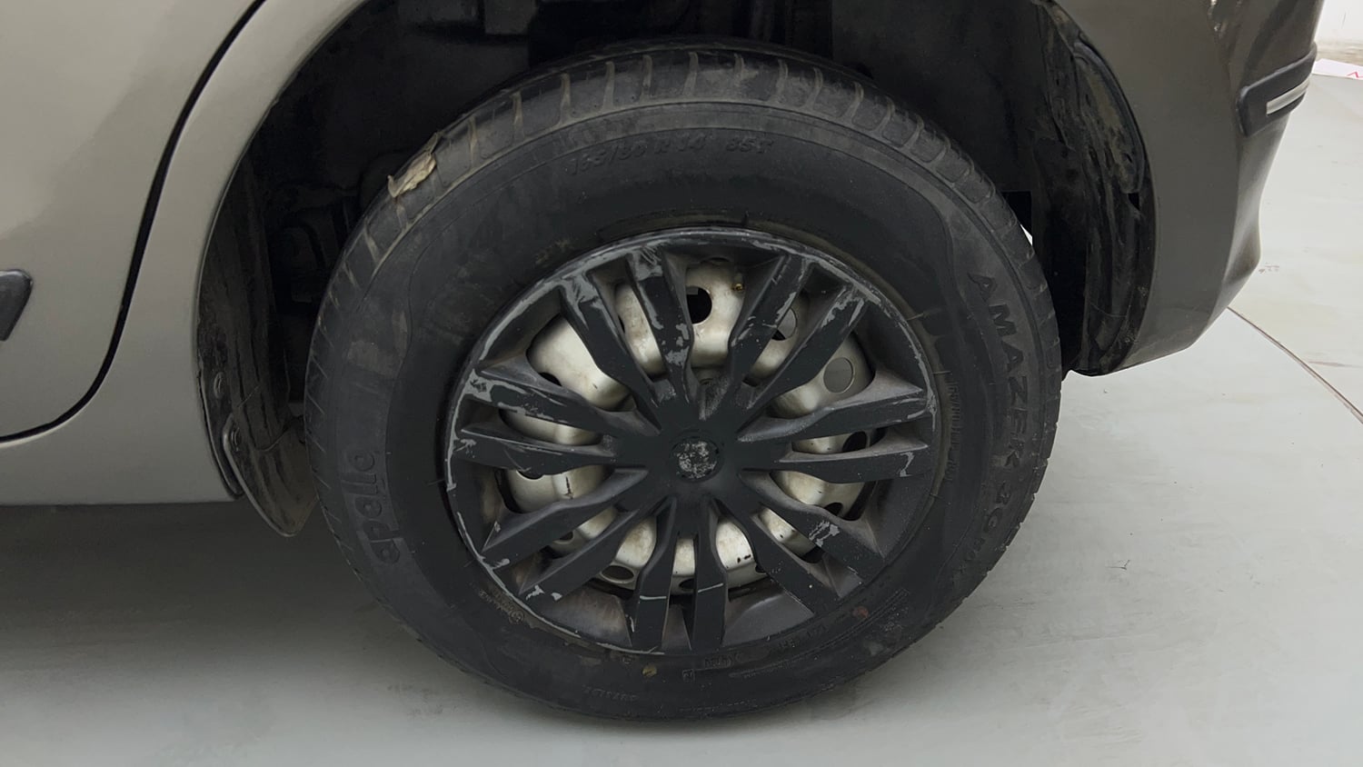 Used 2021 Maruti Suzuki Swift LXi Petrol Manual tyres LEFT REAR TYRE RIM VIEW
