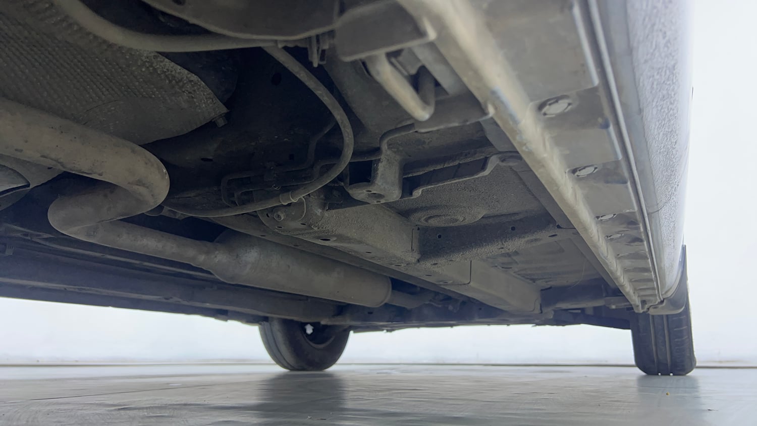 Used 2012 Maruti Suzuki Swift Dzire VXI Petrol Manual extra REAR RIGHT UNDERBODY VIEW