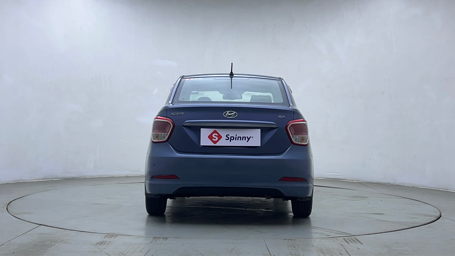 Used 2015 Hyundai Xcent SX 1.2 Petrol Manual exterior BACK VIEW