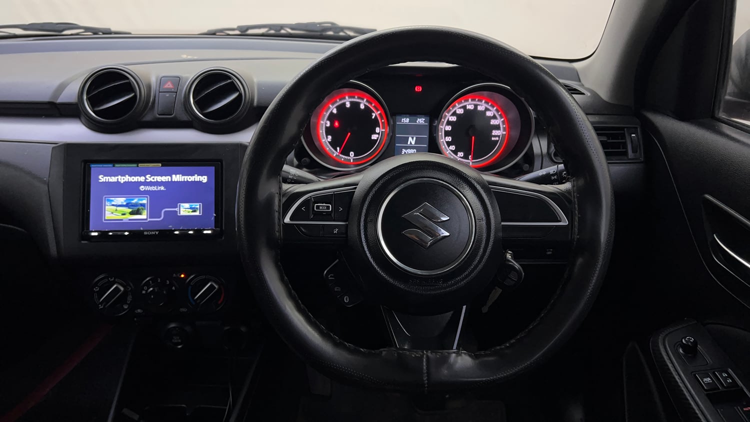 Used 2021 Maruti Suzuki Swift VXi AMT Petrol Automatic interior STEERING VIEW