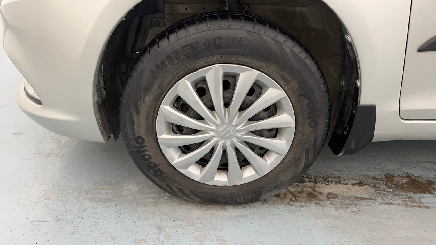 Used 2015 Maruti Suzuki Swift Dzire VXI Petrol Manual tyres LEFT FRONT TYRE RIM VIEW
