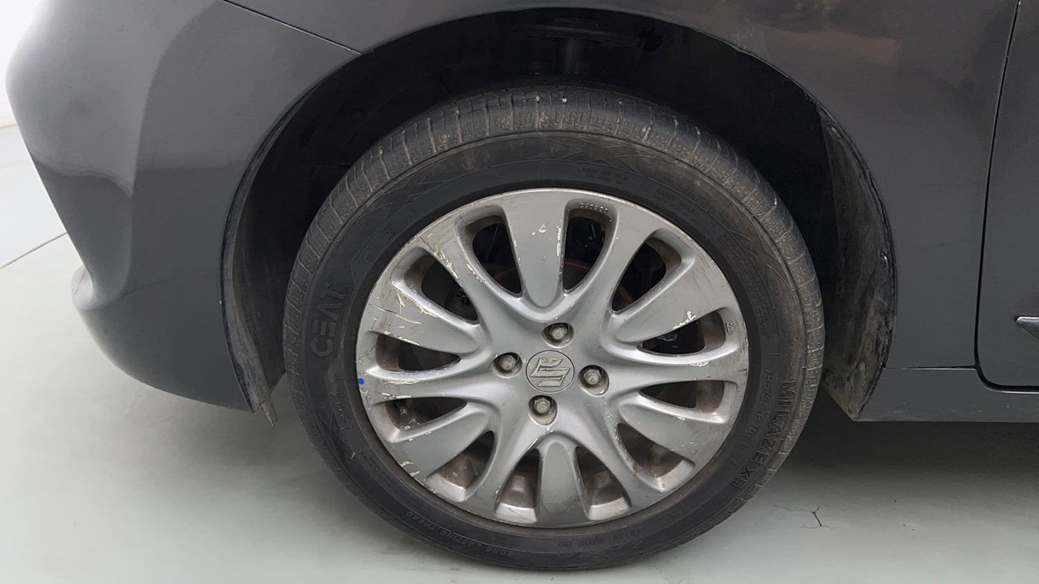 Used 2018 Maruti Suzuki Baleno Zeta 1.2 Petrol Manual tyres LEFT FRONT TYRE RIM VIEW