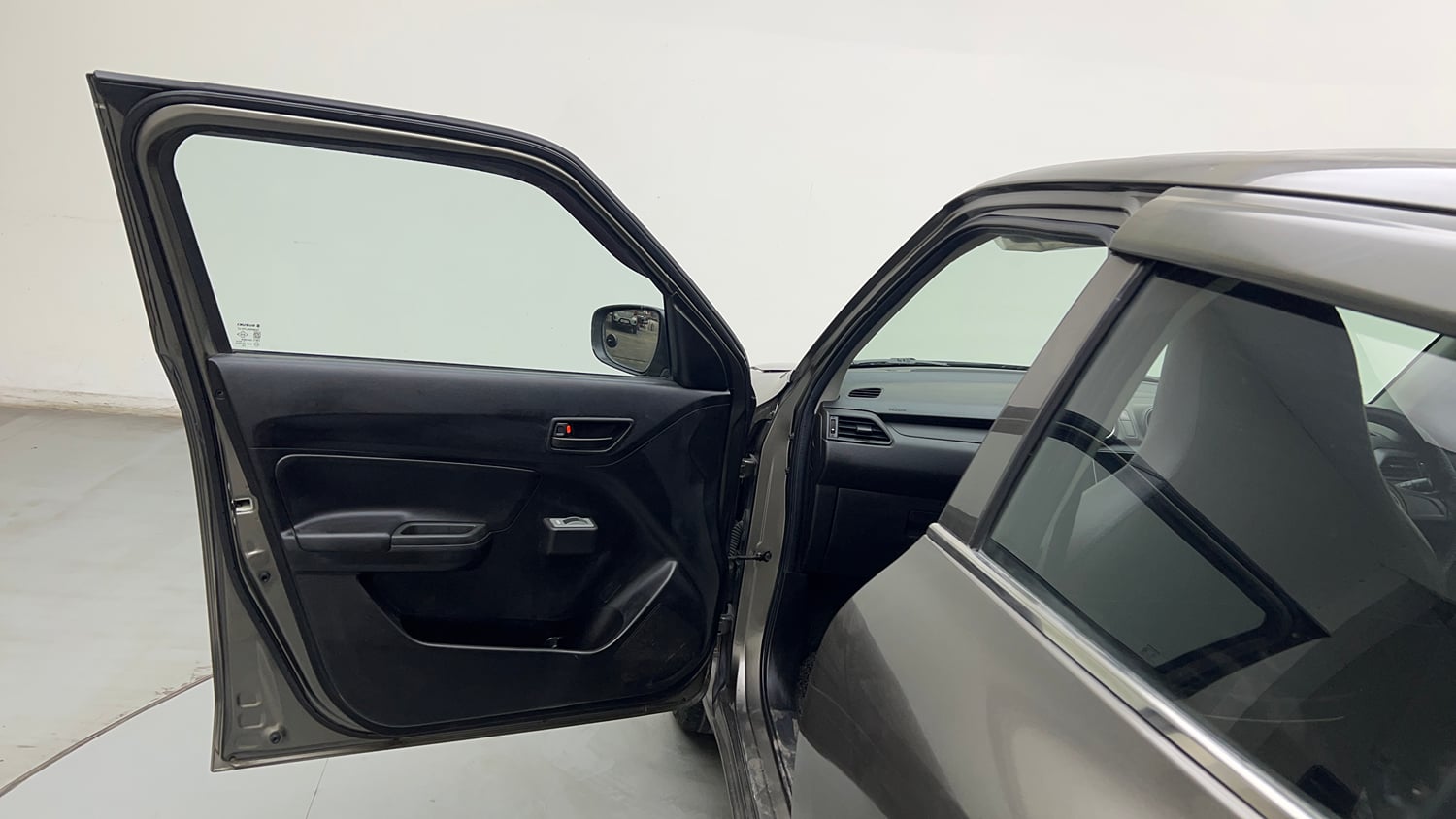Used 2021 Maruti Suzuki Swift LXi Petrol Manual interior LEFT FRONT DOOR OPEN VIEW