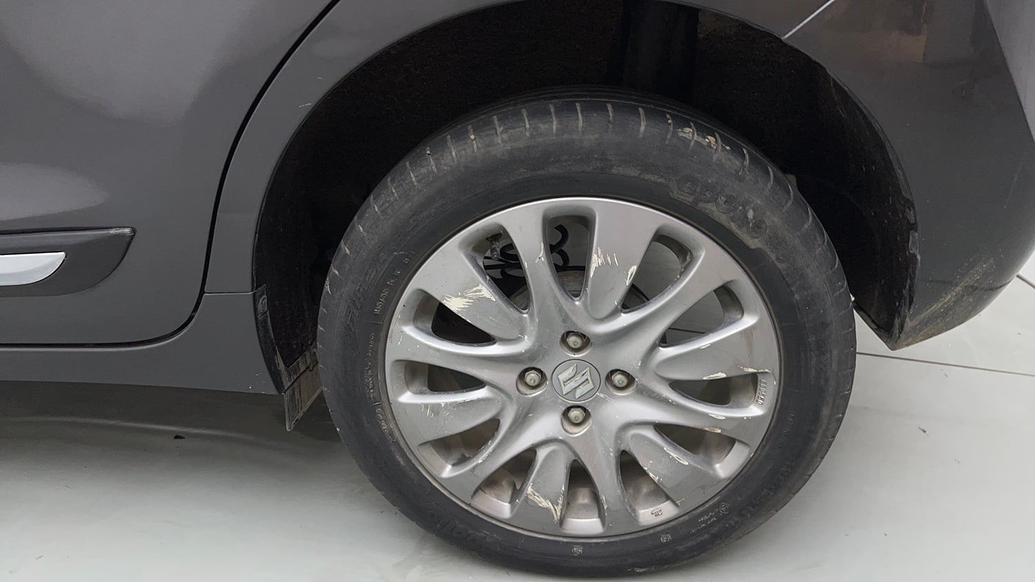 Used 2018 Maruti Suzuki Baleno Zeta 1.2 Petrol Manual tyres LEFT REAR TYRE RIM VIEW