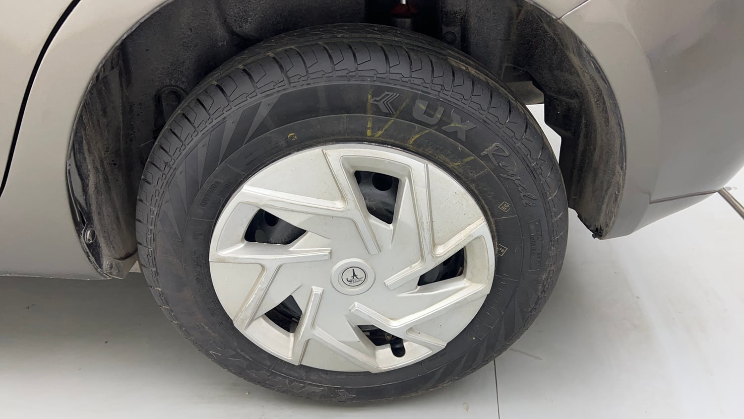 Used 2015 Maruti Suzuki Swift Dzire VXI Petrol Manual tyres LEFT REAR TYRE RIM VIEW
