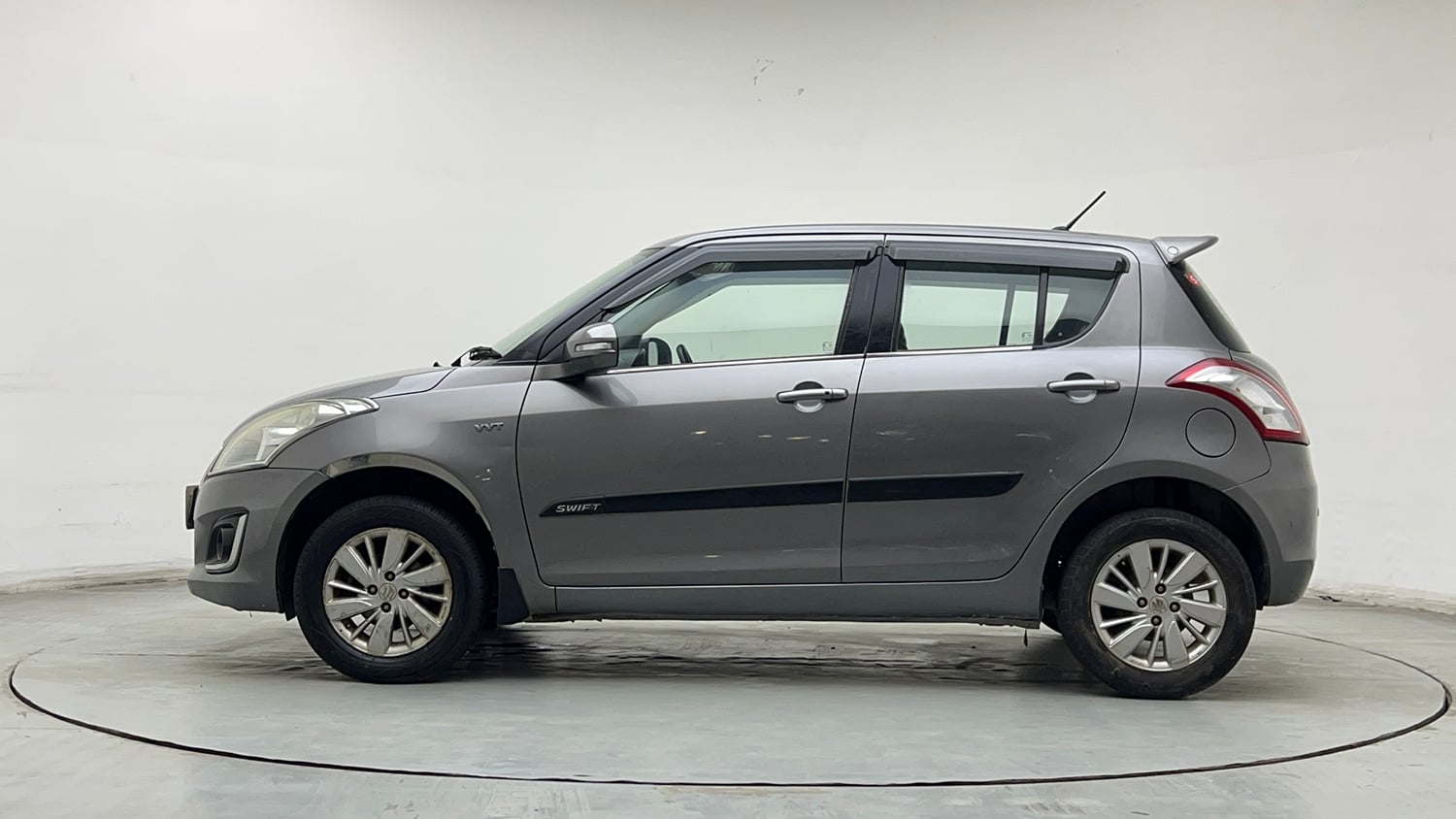 Used 2015 Maruti Suzuki Swift ZXi Petrol Manual exterior LEFT SIDE VIEW