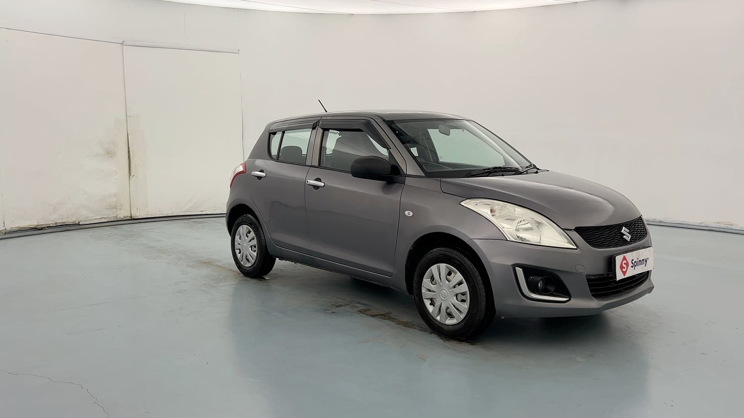 Used 2017 Maruti Suzuki Swift LXi Petrol Manual exterior RIGHT FRONT CORNER VIEW