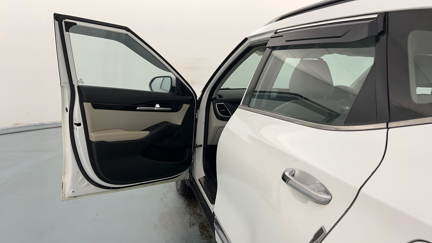 Used 2020 Kia Seltos HTX 1.5 Petrol Manual interior LEFT FRONT DOOR OPEN VIEW