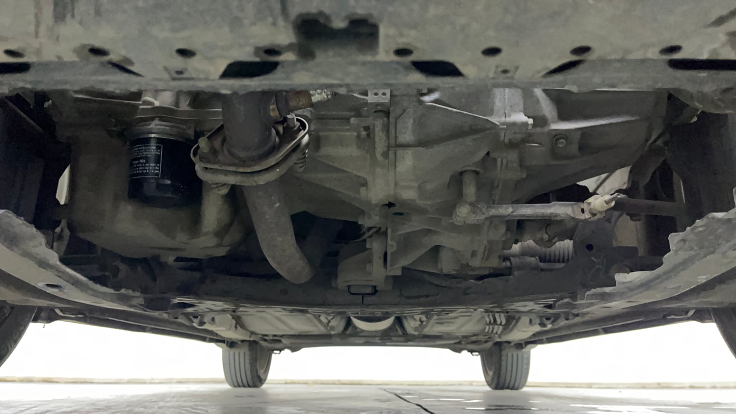Used 2022 Maruti Suzuki Baleno Zeta Petrol Manual extra FRONT LEFT UNDERBODY VIEW