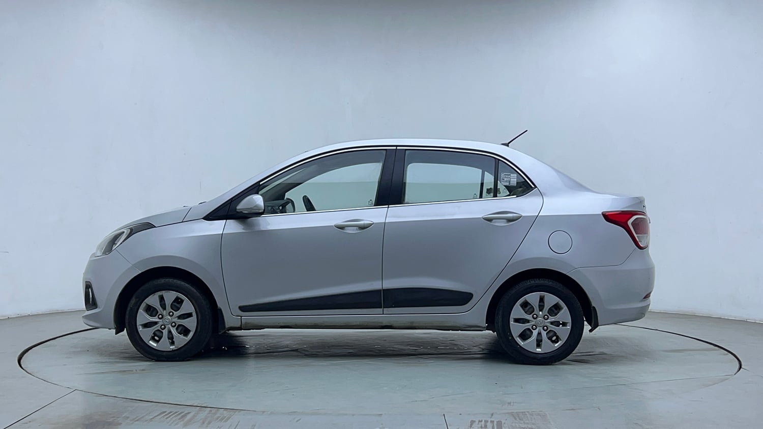 Used 2015 Hyundai Xcent S 1.2 Petrol Manual exterior LEFT SIDE VIEW