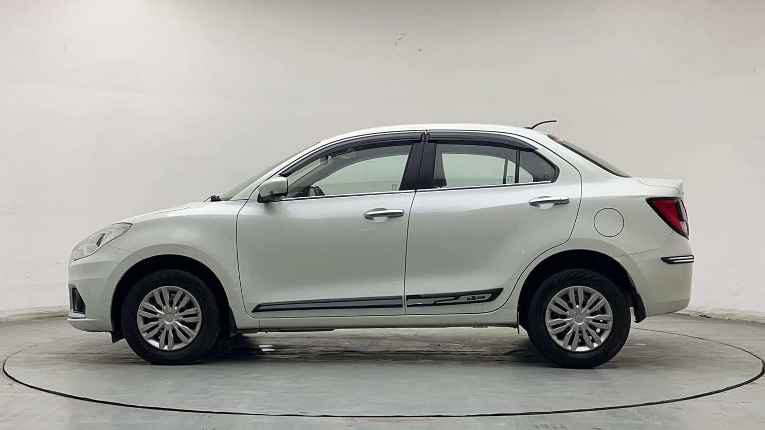 Used 2021 Maruti Suzuki Dzire VXi Petrol Manual exterior LEFT SIDE VIEW