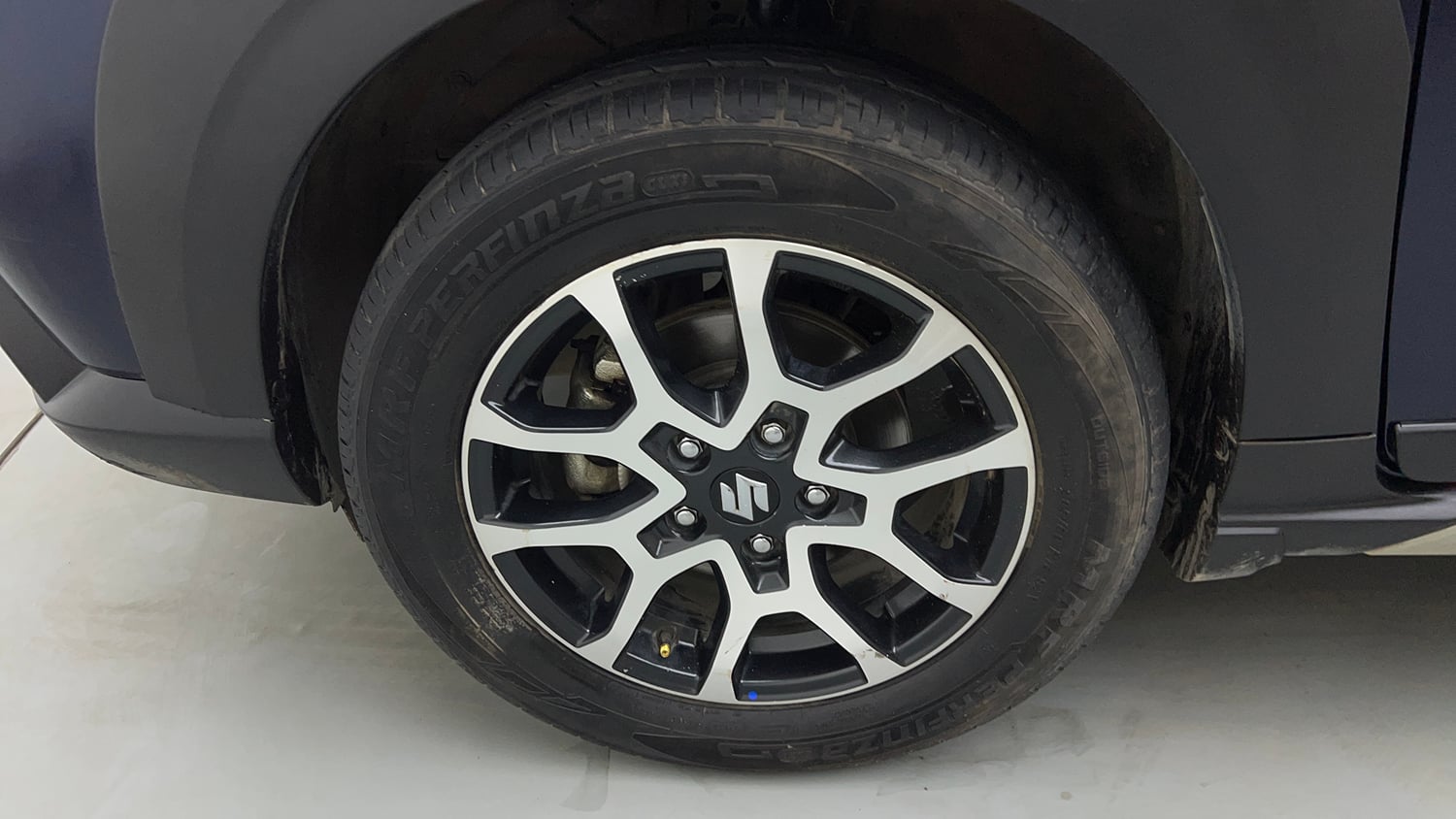 Used 2022 Maruti Suzuki XL6 Zeta MT Petrol Petrol Manual tyres LEFT FRONT TYRE RIM VIEW