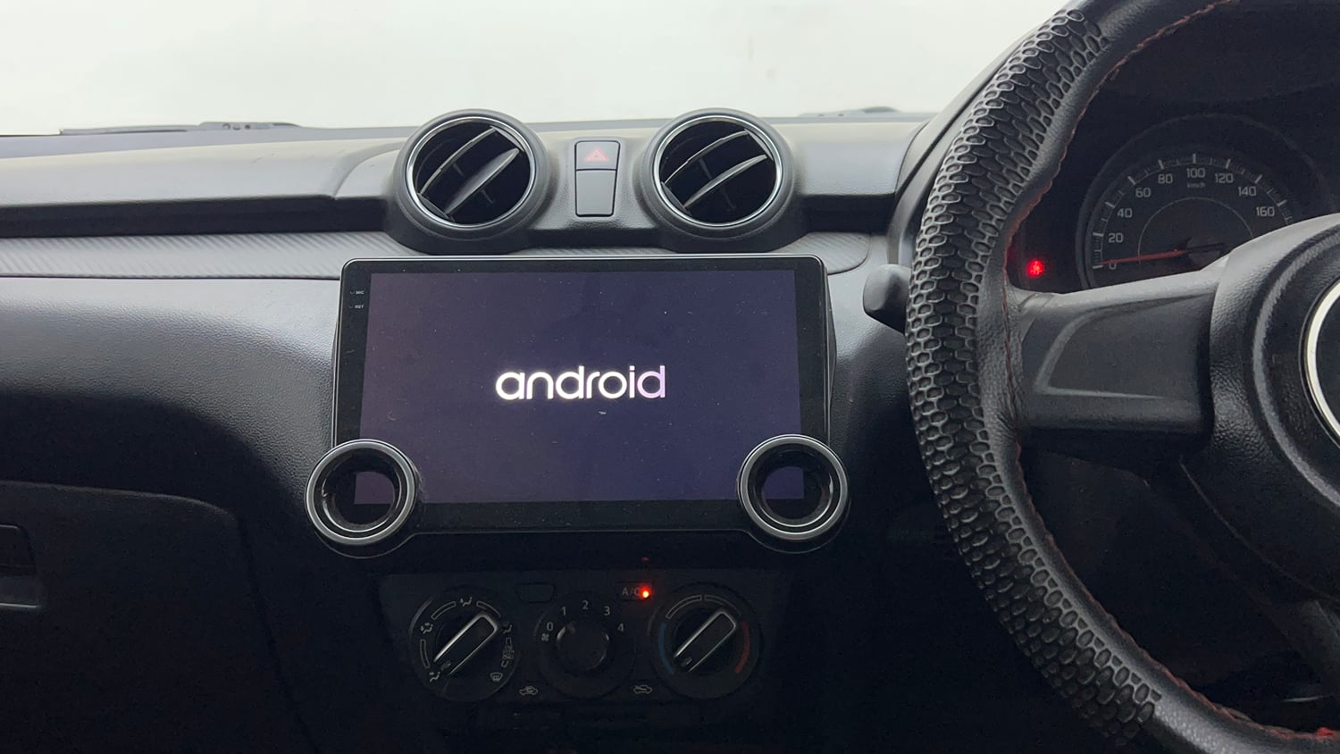 Used 2021 Maruti Suzuki Swift LXi Petrol Manual interior MUSIC SYSTEM & AC CONTROL VIEW