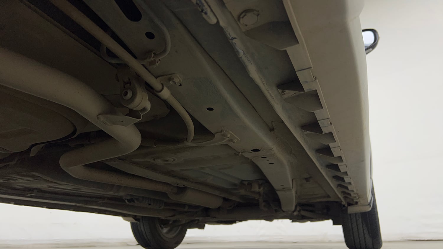 Used 2022 Maruti Suzuki XL6 Zeta MT Petrol Petrol Manual extra REAR RIGHT UNDERBODY VIEW